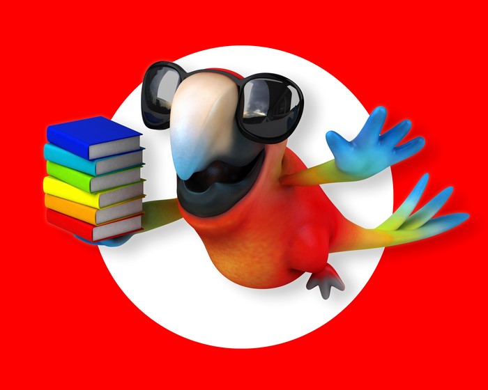 Parrot wearing sunglasses holding books