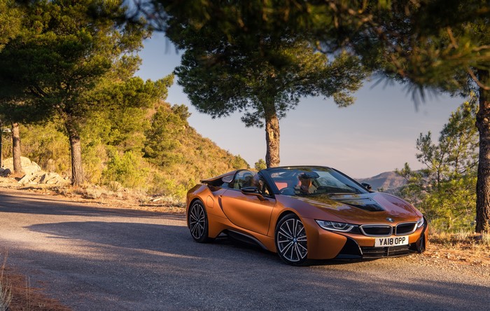Orange 2018 BMW i8 Roadster on a Road