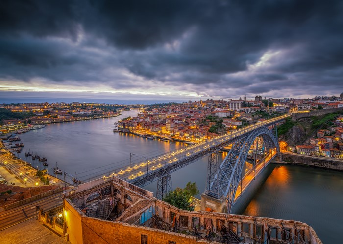 Dom Luís I Bridge over Douro River in Porto, Portugal at Dusk