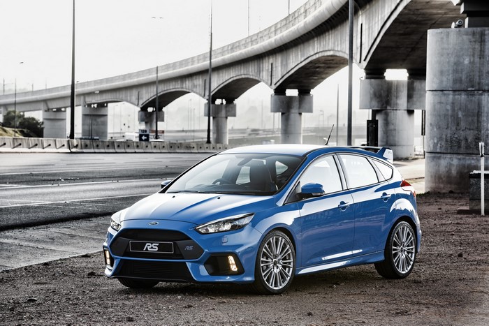 Blue Ford Focus RS car under a bridge