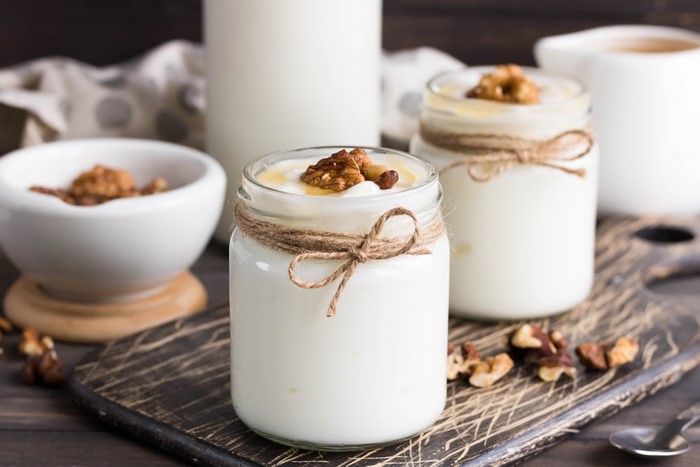 Yogurt in jars with nuts and honey
