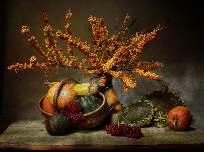 Still-life with pumpkins, berries, and sunflowers