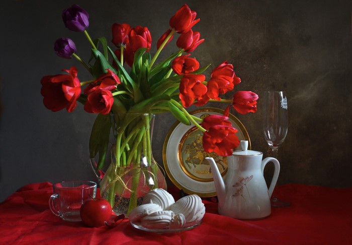Still-life with tulips, zefir, apple, kettle, and stemware