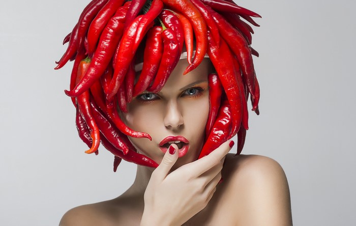 Woman with red chili pepper hair