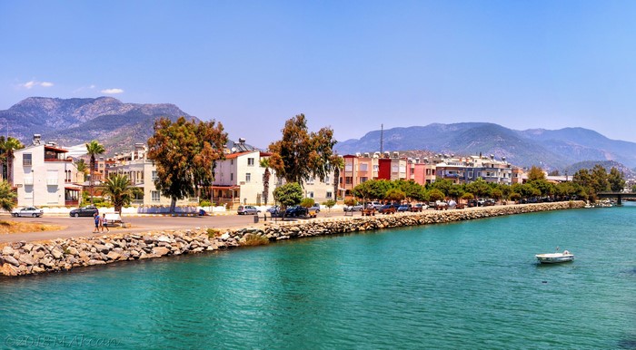 Coastal town with mountains and a river in Turkey