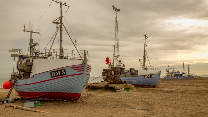 Fishing boats on a sandy coast
