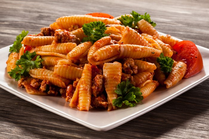 Pasta with meat sauce and parsley