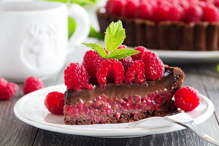 Slice of Raspberry Chocolate Tart with Mint