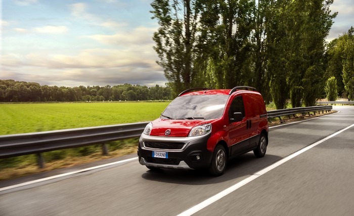 Red 2016 Fiat Fiorino Adventure Van on Road
