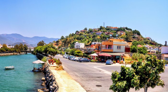 Houses on a hill overlooking a river in Turkey