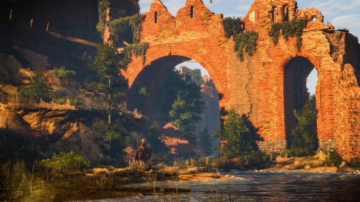 Geralt of Rivia from The Witcher 3: Wild Hunt on horseback near a ruined fortress