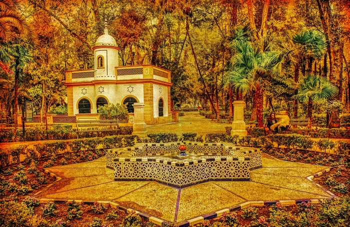 Fountain and building in Maria Luisa Park, Seville, Spain