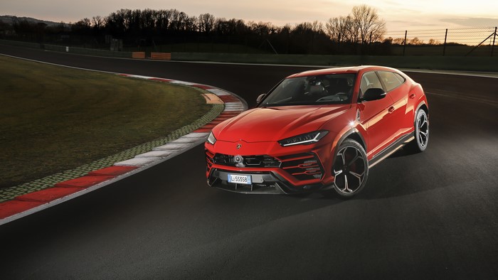Red Lamborghini Urus on a Race Track