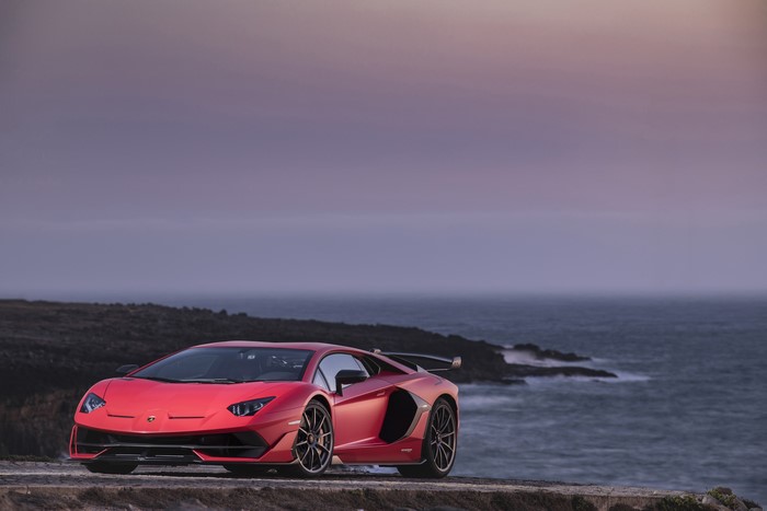 Red Lamborghini Aventador SVJ by the Ocean