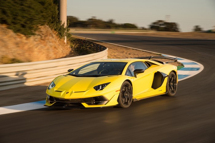Yellow Lamborghini Aventador SVJ on a Racetrack