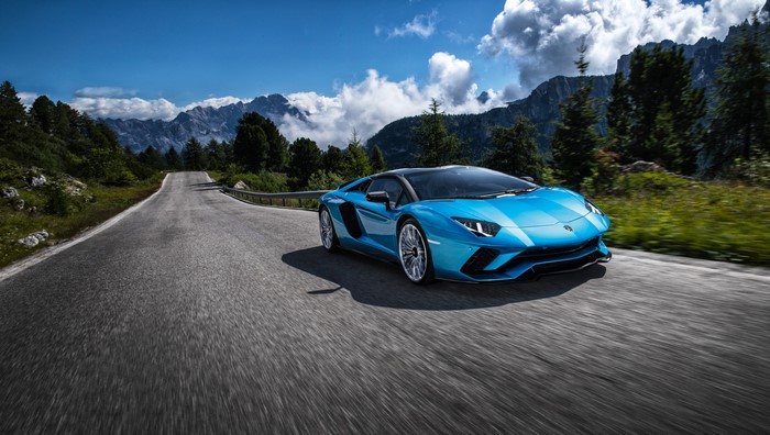Light Blue Lamborghini Aventador S Roadster on Mountain Road