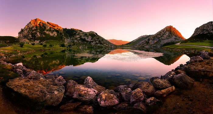 Lake Enol Asturias Spain mountains reflection stones