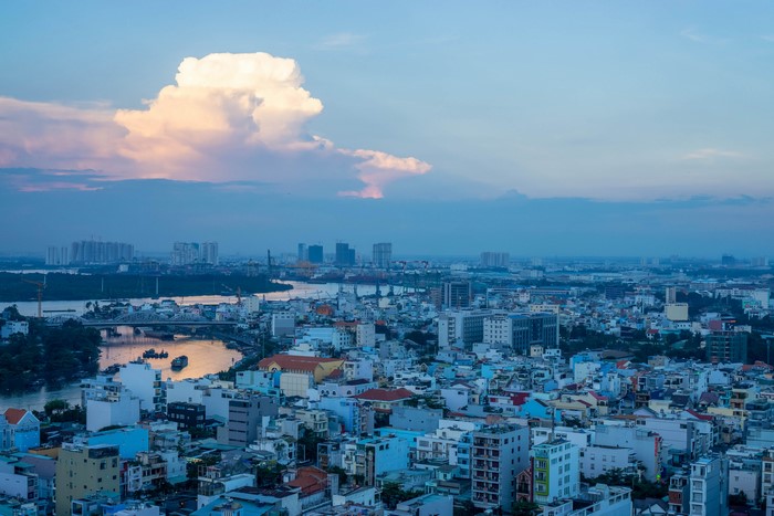 Ho Chi Minh City skyline at dusk with river