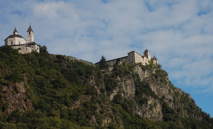 Monastery and church on a rocky cliff in Italy
