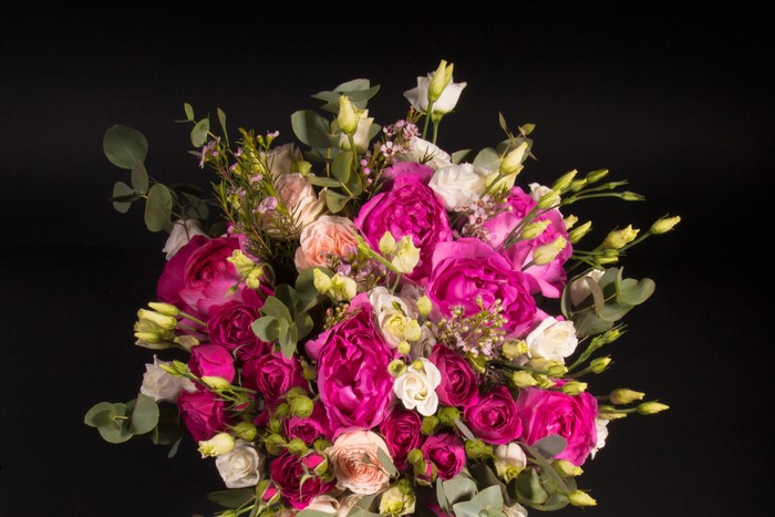 Pink and white roses bouquet with eucalyptus