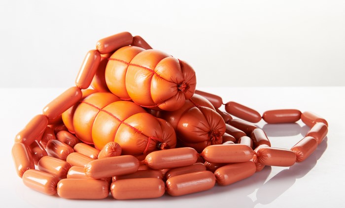 Sausages and Vienna sausages on a white background