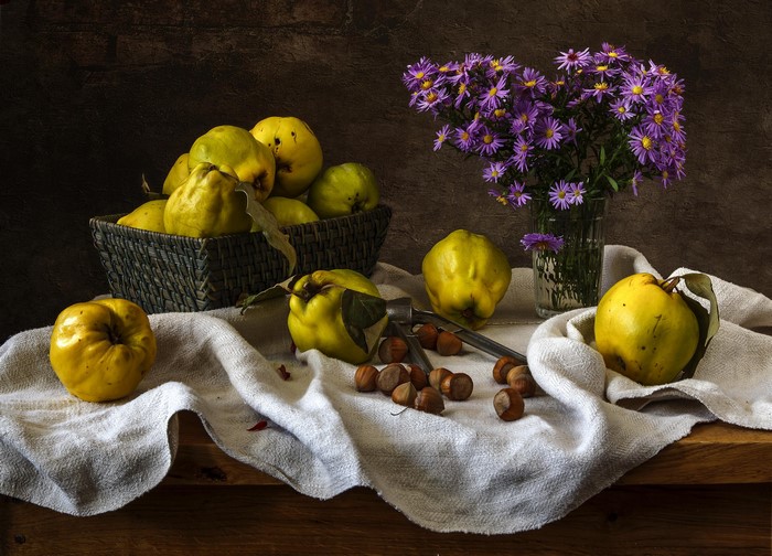 Still life with quinces, hazelnuts, and asters