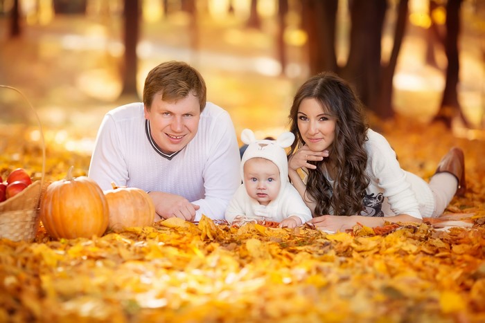 Family with Baby in Autumn Park