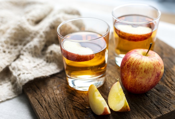Apple Juice in Glasses with Apples