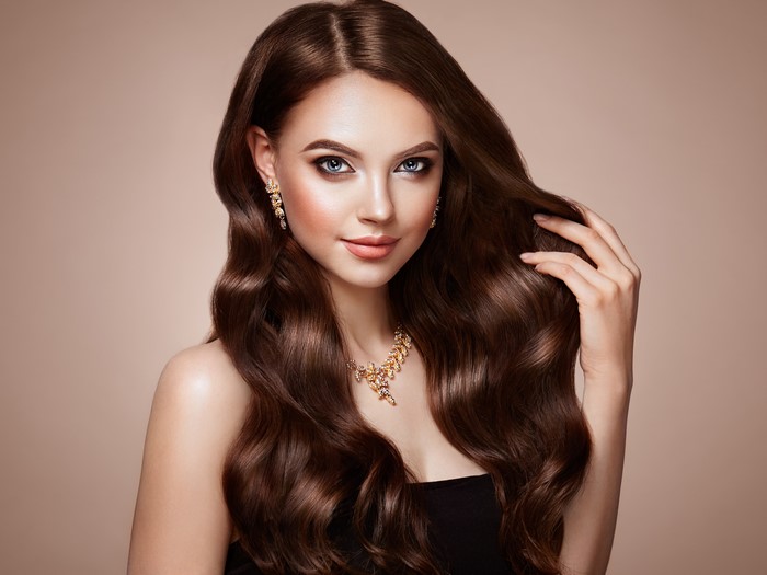 Brown haired woman with jewelry