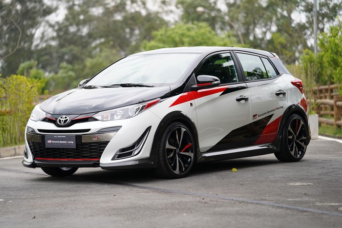 White Toyota Yaris GR Sport with Red and Black Decals