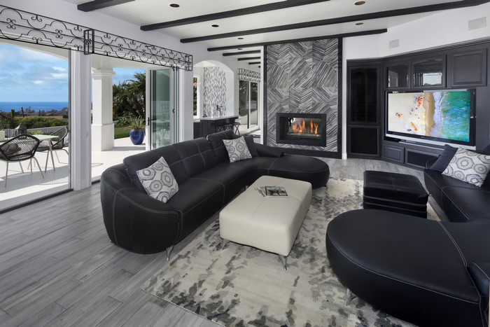 Living room interior design with sofa and fireplace
