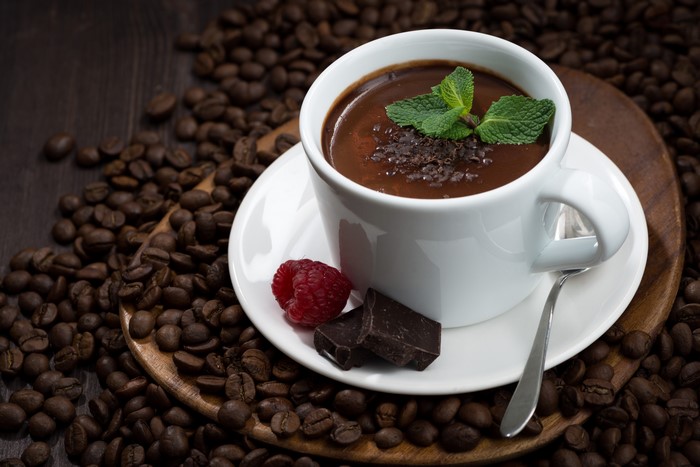 Hot chocolate with raspberry and chocolate garnish