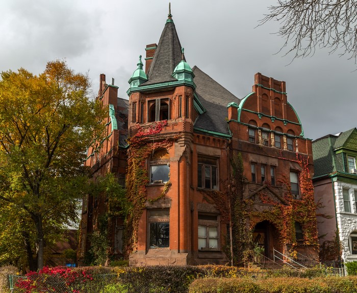 Autumn scene of a historic brick mansion in Chicago