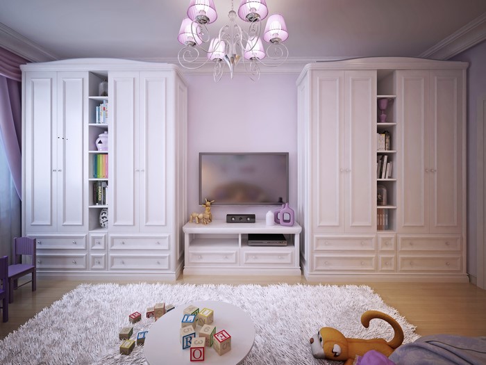 Children's room with white wardrobes and toys