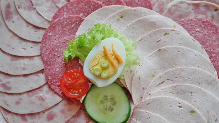 Sliced Sausage Platter with Egg, Tomato, and Cucumber