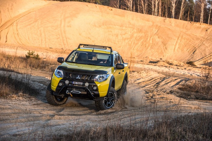 Yellow Mitsubishi L200 Monster Concept Pickup Truck Off-Roading