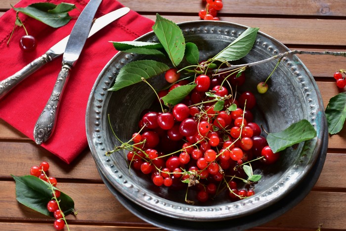 Cherries and Currants in a Bowl with Knives