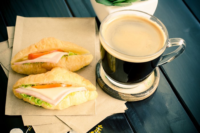 Croissant sandwiches and coffee