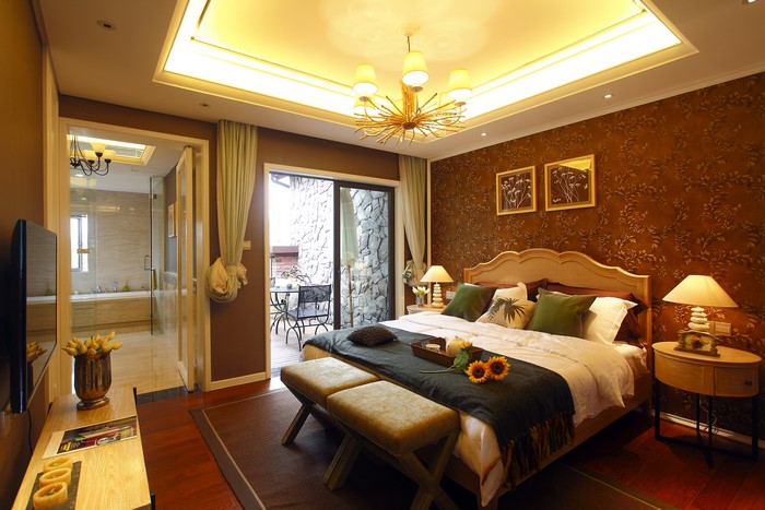 Bedroom with Chandelier and Lamps