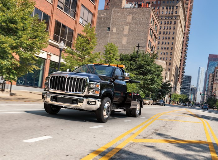 Black 2018 International CV Day Cab Wrecker Truck in Motion