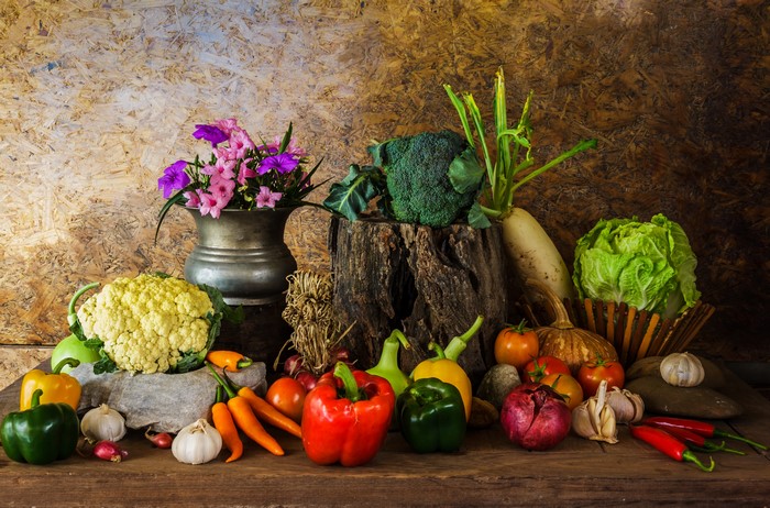 Still life with vegetables and flowers