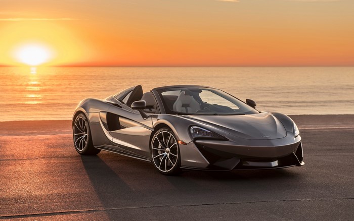 McLaren 570S Spider convertible sports car at sunset