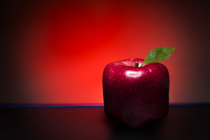 Red Apple with Green Leaf