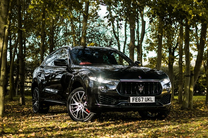 Black Maserati Levante S Q4 GranSport in forest