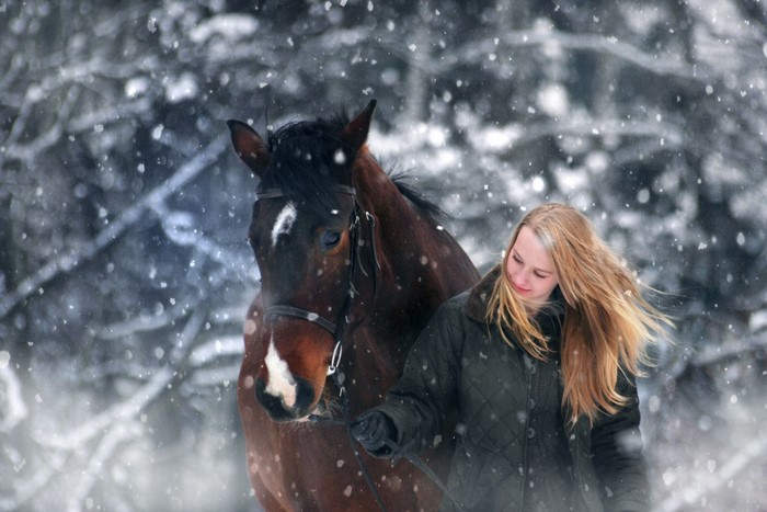 Girl with Horse in Snow
