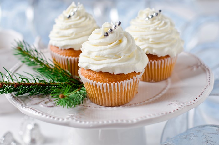 Three Cupcakes with White Frosting and Silver Sprinkles