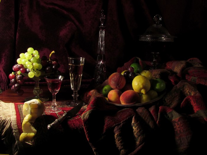 Still-life with grapes, lemons, wine, and stemware