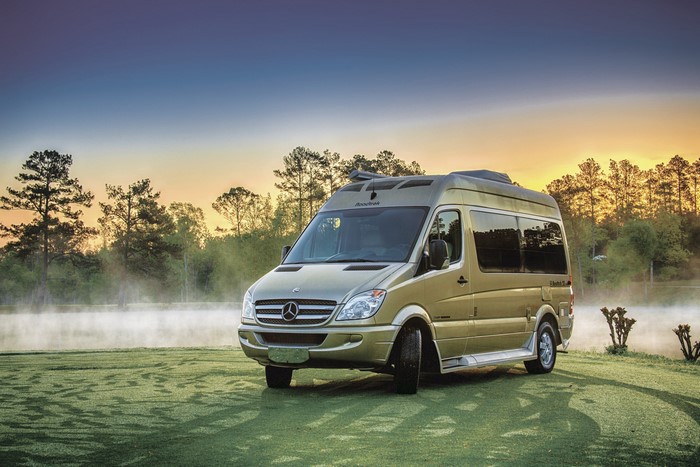 Gold Mercedes-Benz Sprinter Camper Van by a Lake