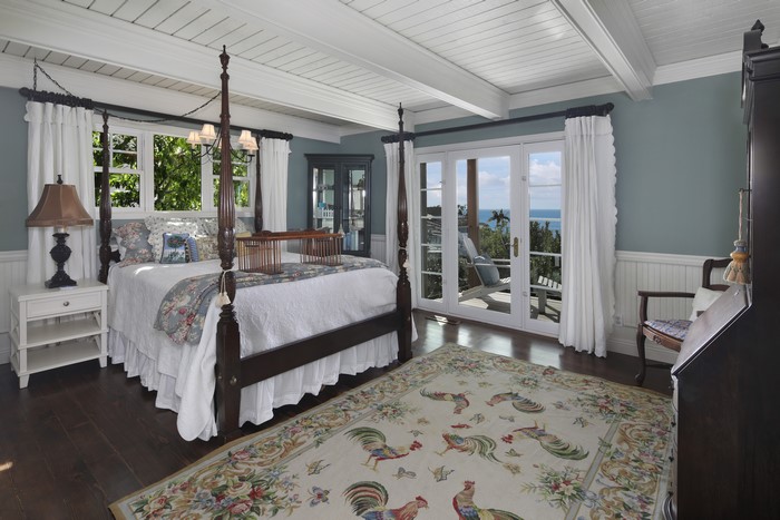 Bedroom with Four-Poster Bed and Ocean View