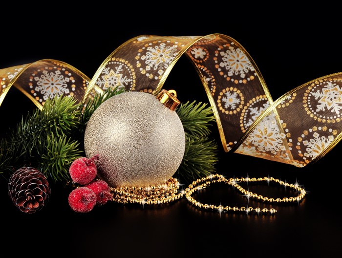 Christmas ornaments with ribbon and pine cone